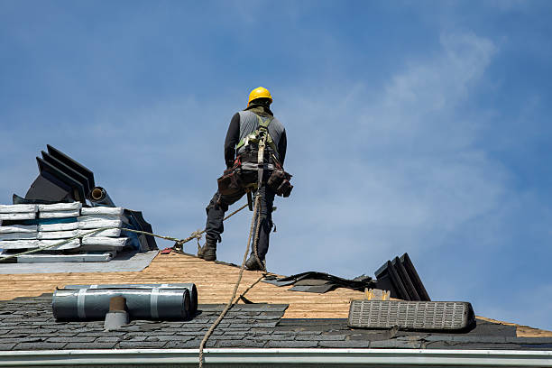 Professional Roof Replacement technician working in Whiting, WI